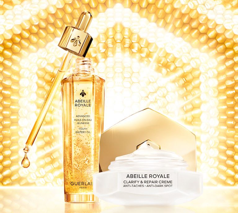 Banner advertising for Guerlain Abeille Royale featuring an image of the product
