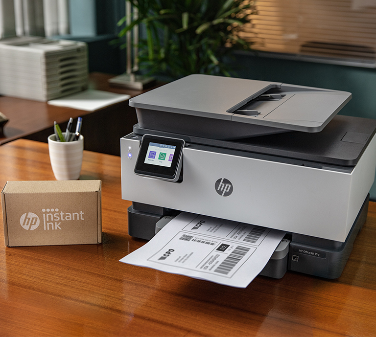 HP OfficeJet printer with instant ink box